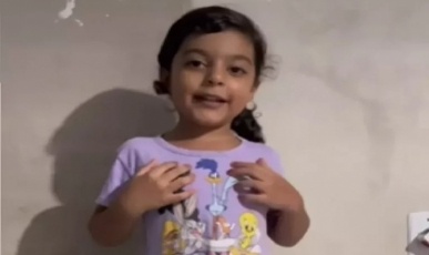 Vídeo: Menina de 4 anos diz que adorou roupas recebidas por doação no RS